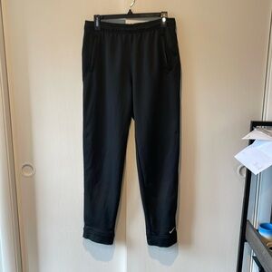 Nike Fit Dry Black Ankle Zip Workout Pants Size Medium. Zippered ankles